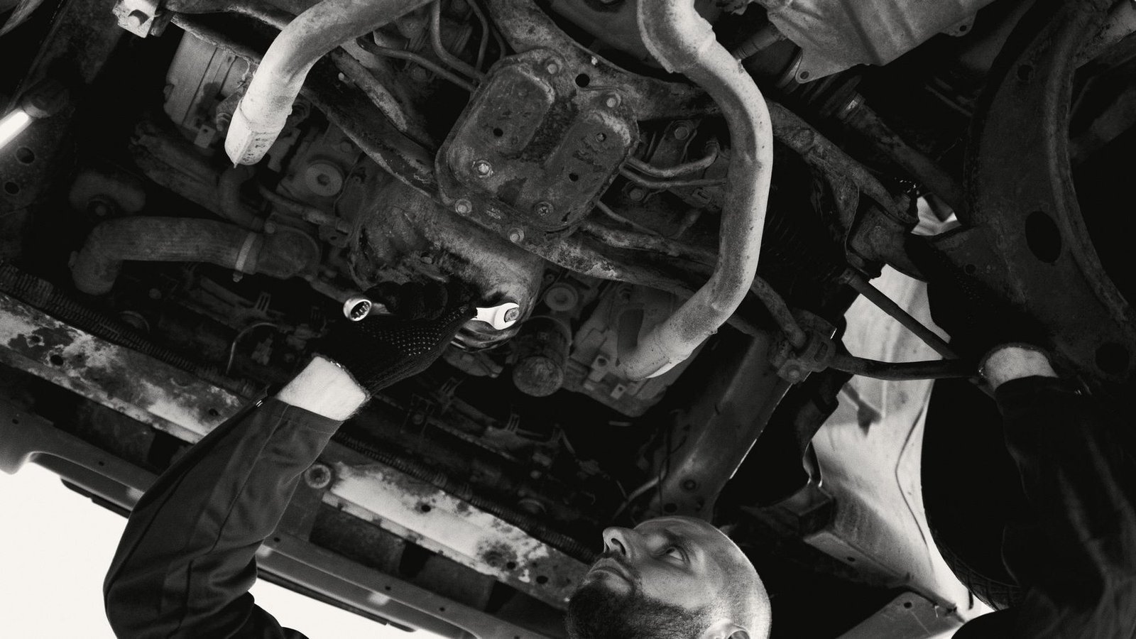 Black and white view of a car's underside